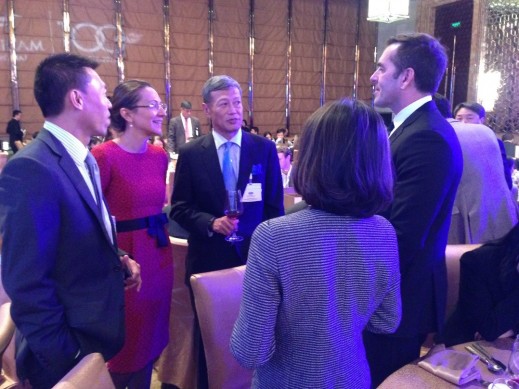 HCP Asia MD Vanessa Moriel talking with senior automotive executives at the AmCham 100th anniversary gala. 