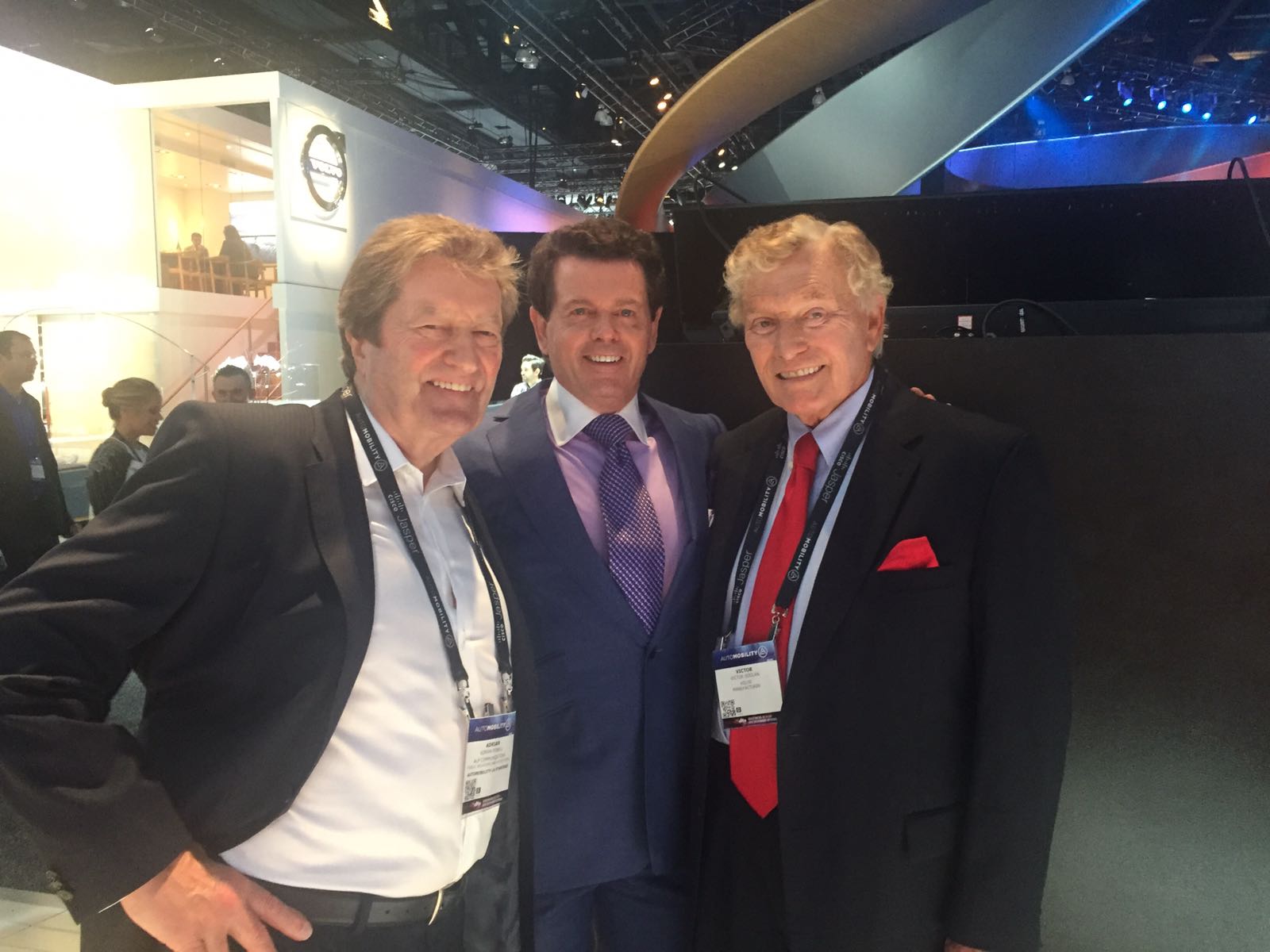 LIASE Group Non-Executive Board Member, Vic H. Doolan (right), poses for a picture with Gerry McGovern, Land Rover Chief Design Officer (center).