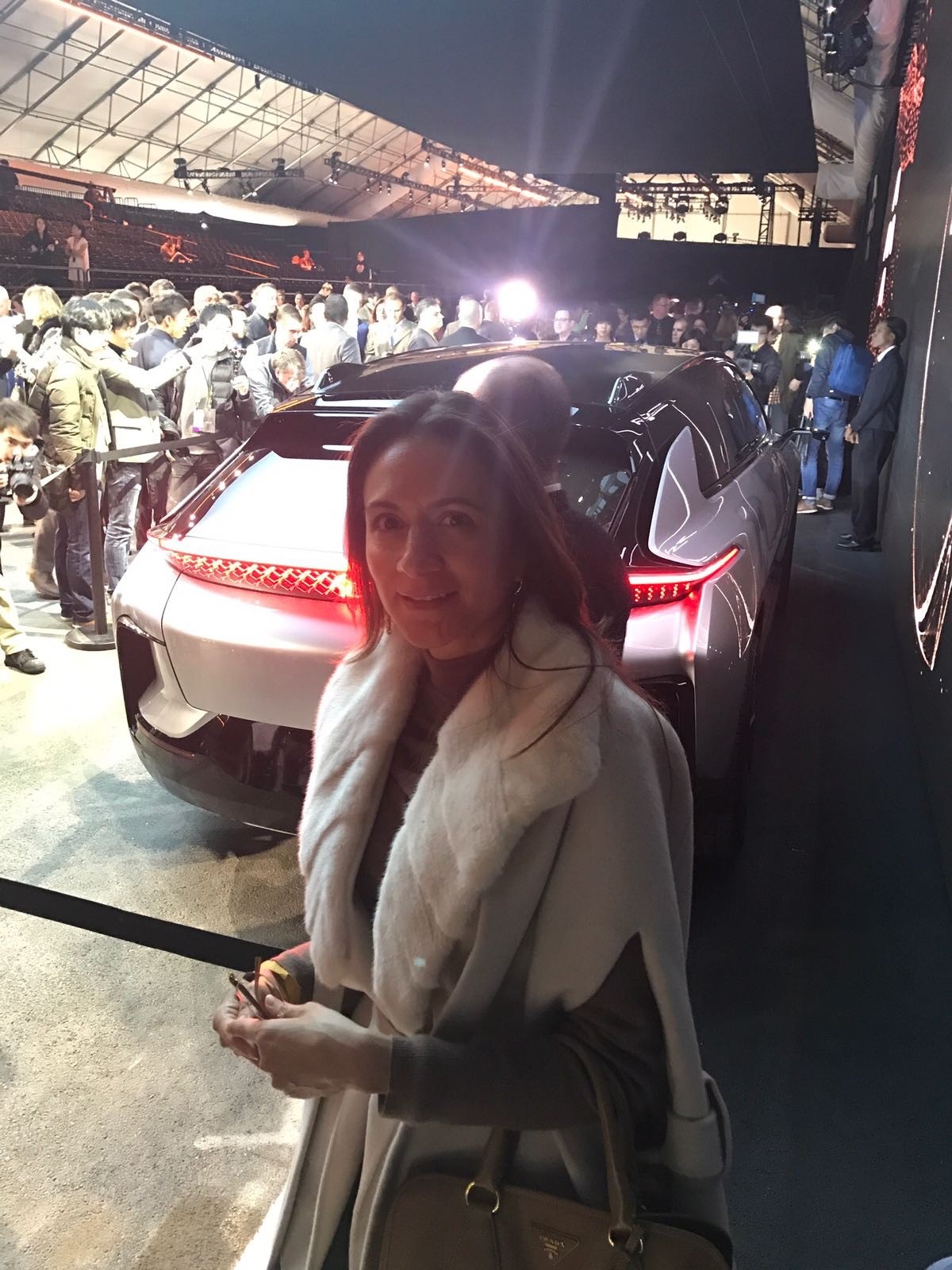 Vanessa Moriel, LIASE Group Managing Director Asia stands in front of the newly revealed FF 91 SUV at CES 2017 in Las Vegas. With the FF91, Faraday Future hopes to rival Tesla in the high-end all-electric car market. 