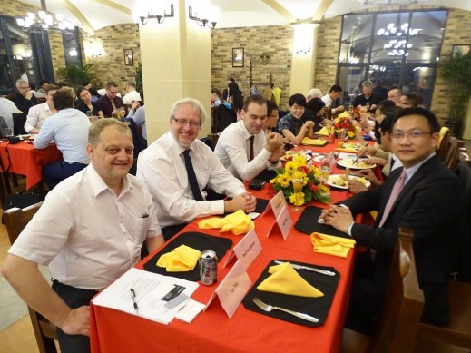 On the left side: Mr. Andreas Börner, Director R&D China, EK Design (Taicang) Co., Ltd. Mr. Juergen Bauer, Manager at Audi Tongji Joint Lab, Audi China Enterprise Management Co.; and, Mr. Roel van de Pas, Managing Director, e-Traction China. Opposite on the right side: Mr. Shen Jun, Managing Director, Accenture (China).