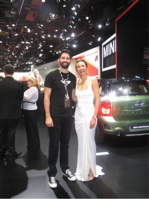 Vanessa Moriel (right) posing with a MINI Genious in front of his booth. BMW owned Mini unveiled the 2015 John Cooper Works Hardtop at the auto show. The new model is the most powerful Mini the company has produced to date